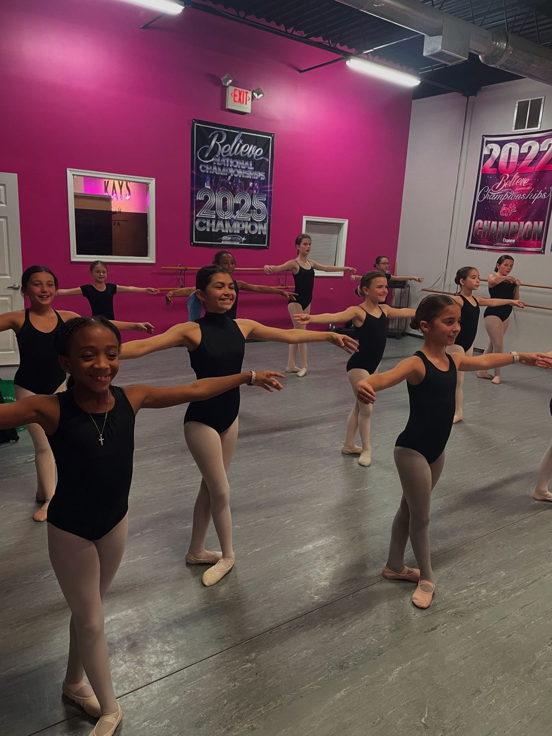 Ballet class at Kay's Act II, championship banners on the wall